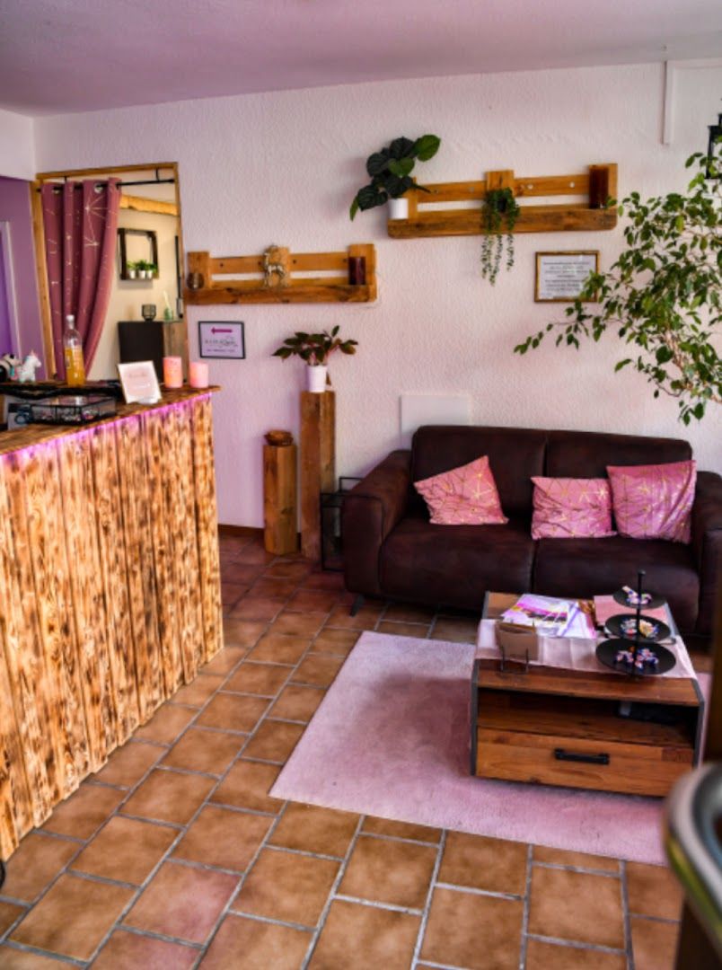 a living room with a couch and a table
