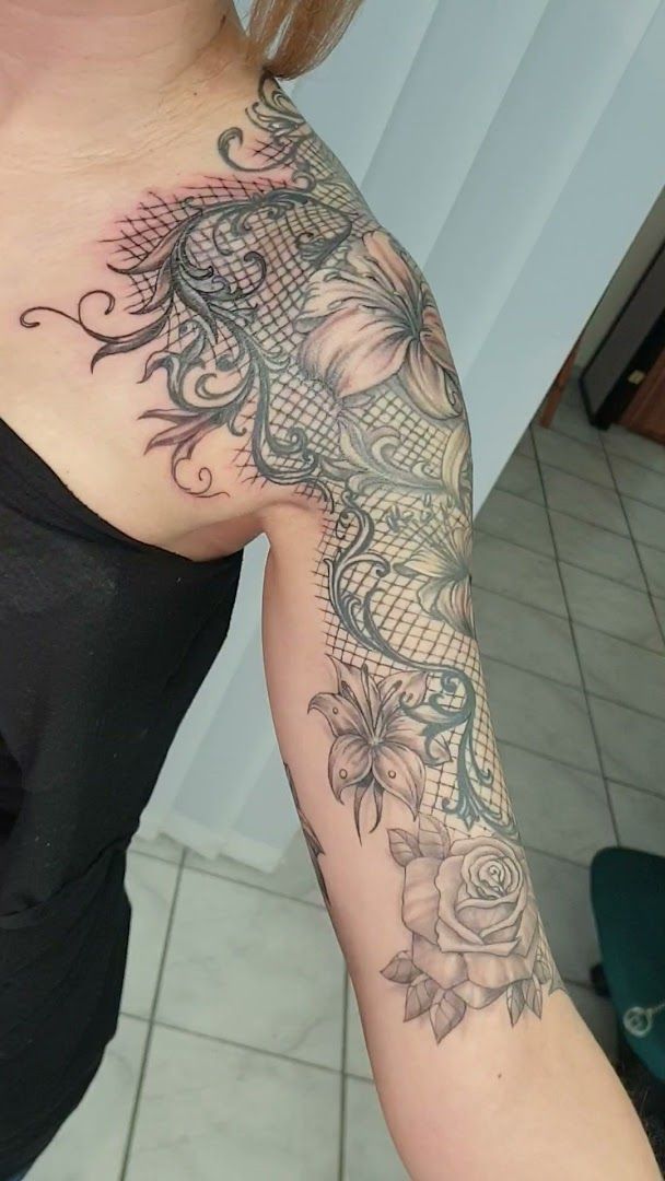 a woman with a narben tattoo on her arm, bielefeld, germany