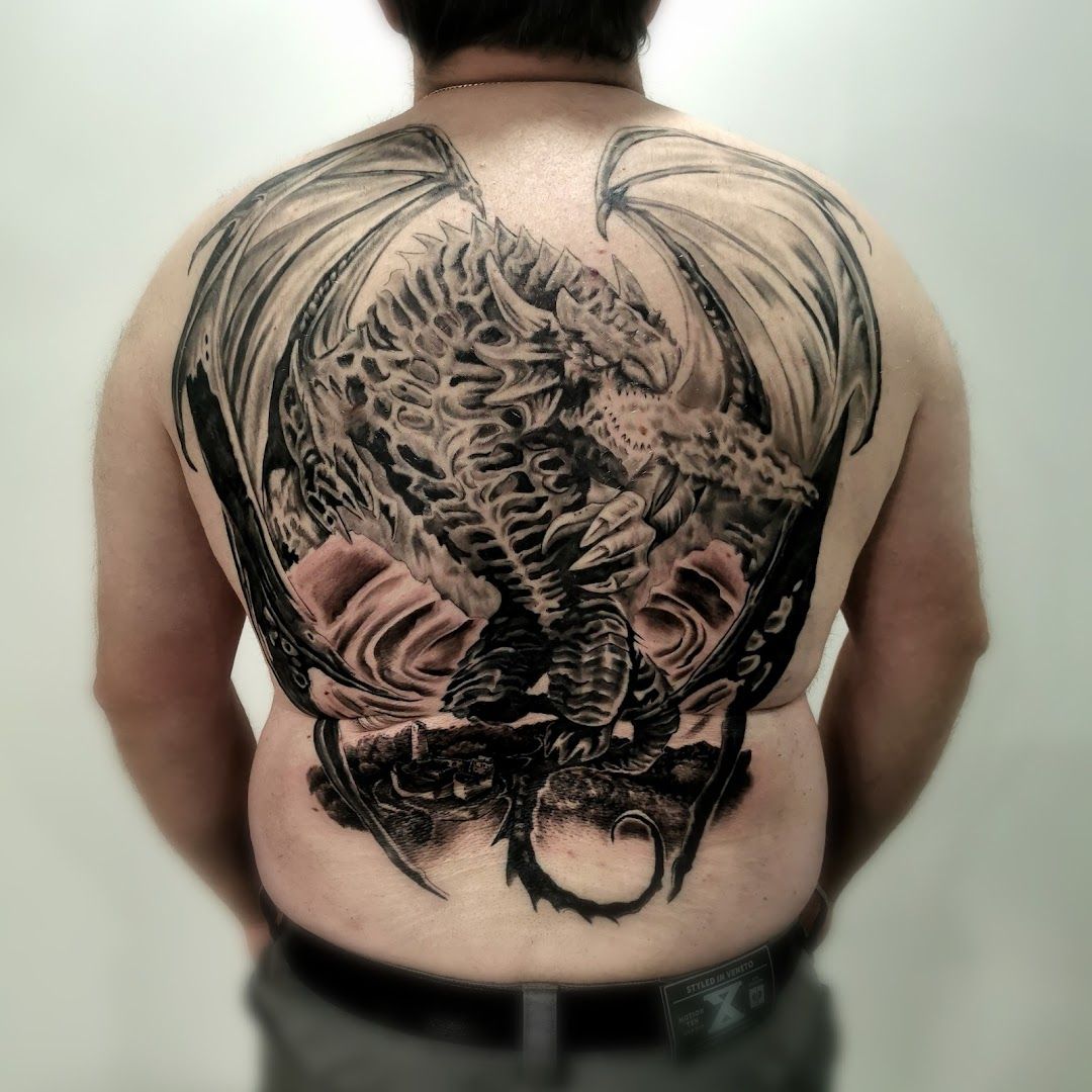 a man with a cover-up tattoo on his back, rhein-neckar-kreis, germany