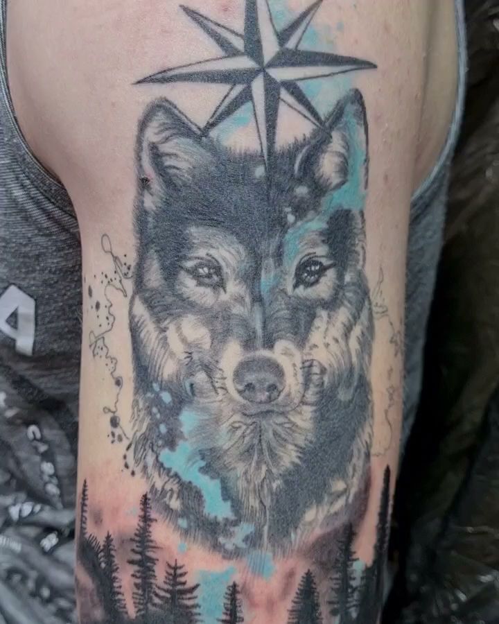 a cover-up tattoo of a wolf with a star on its head, uelzen, germany