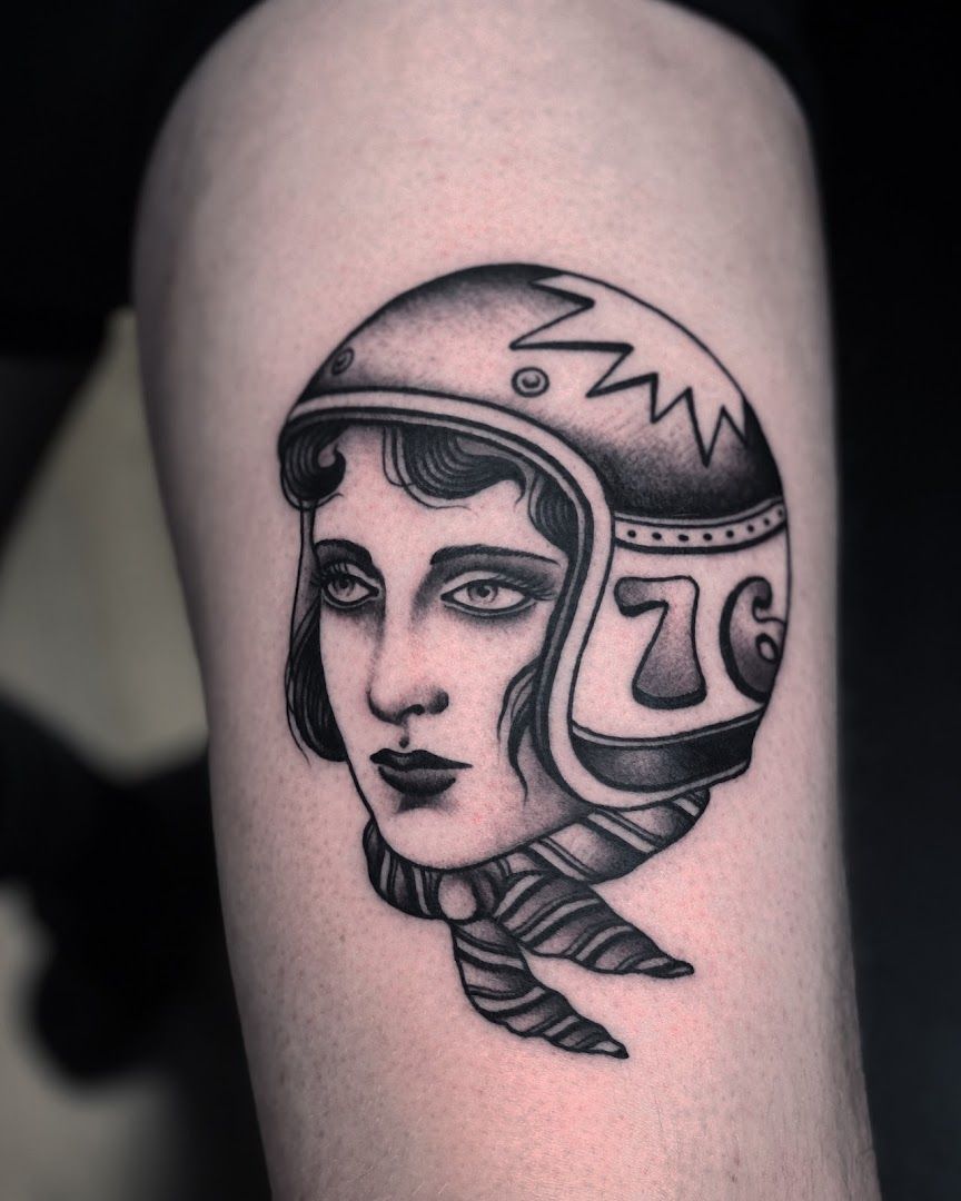 a realistic tattoos of a woman wearing a helmet, marburg-biedenkopf, germany