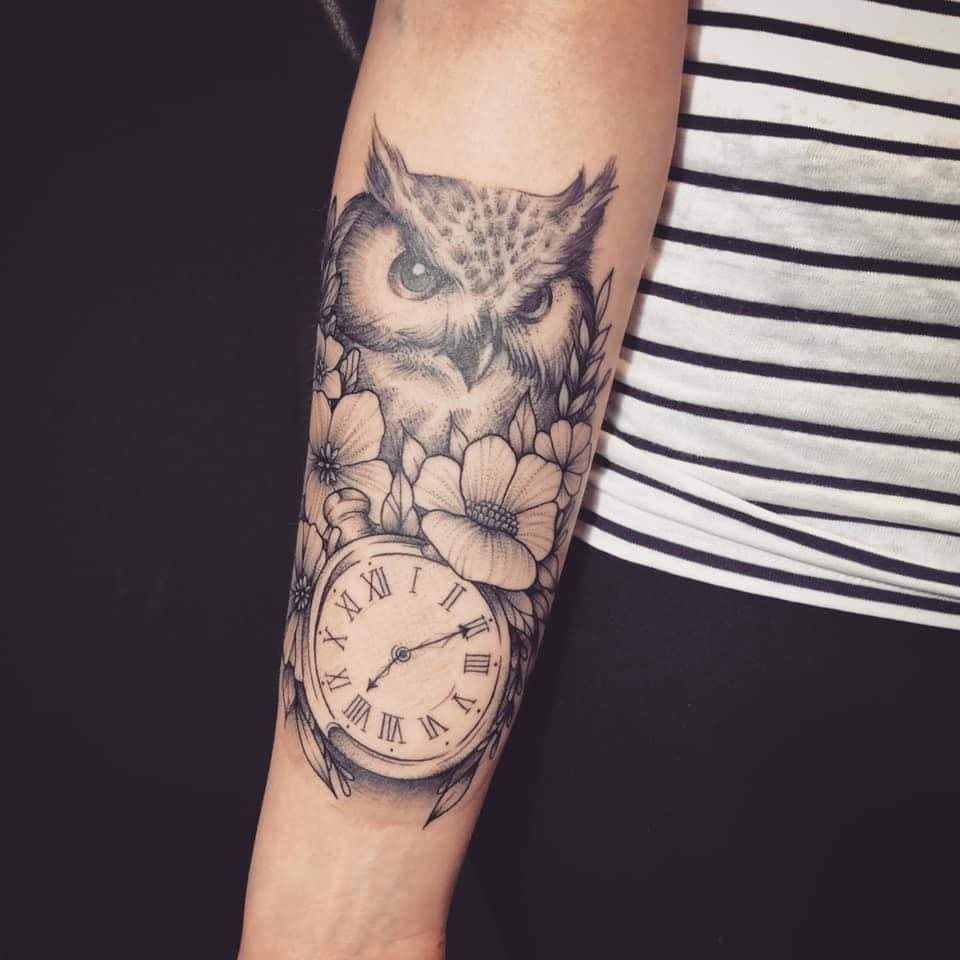 an owl with flowers and a clock narben tattoo, saale-orla-kreis, germany