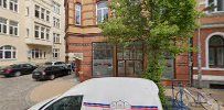 a car parked in front of a building