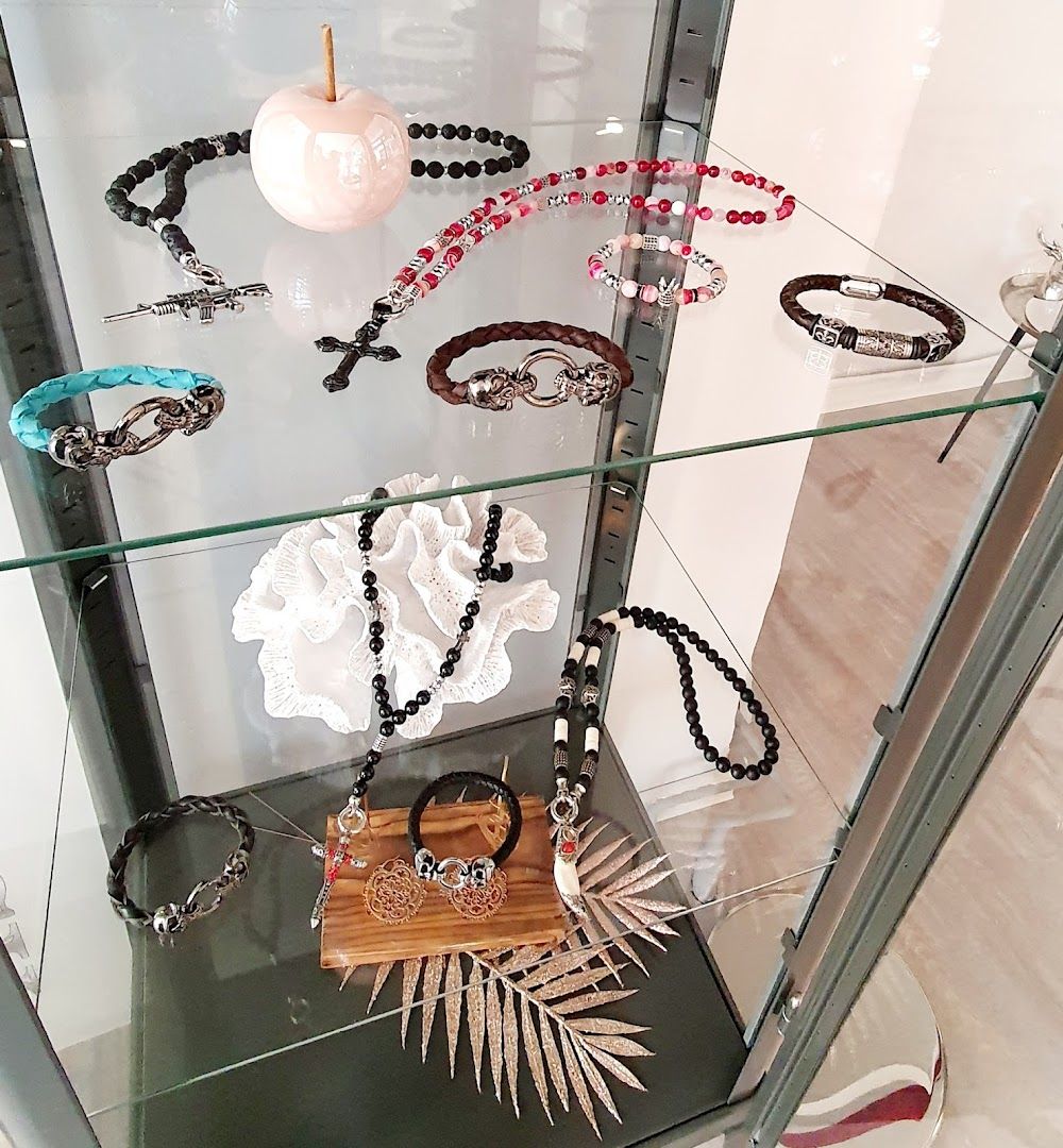 a display case with various jewelry items