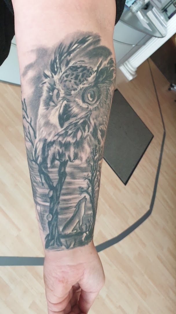 a narben tattoo of a tiger on the arm, kassel, germany