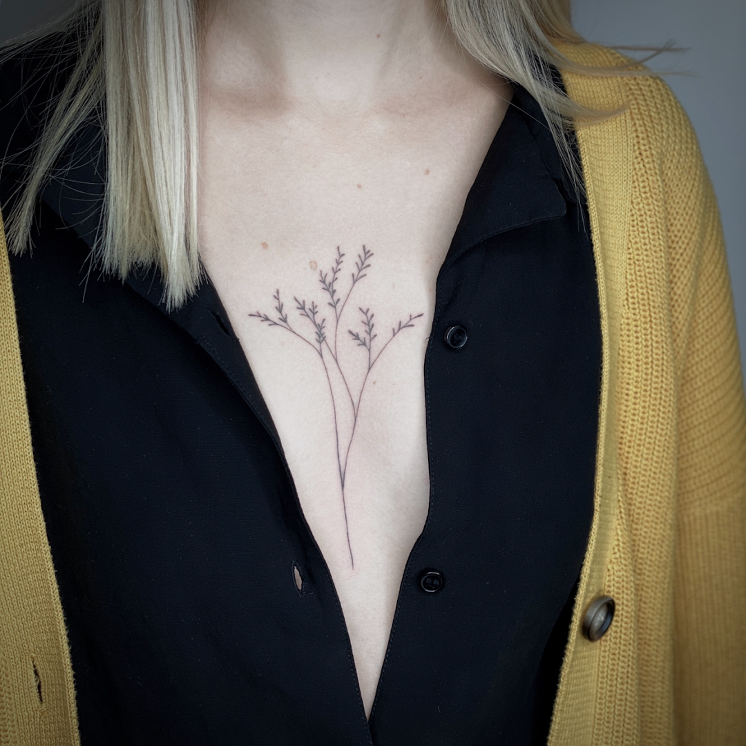 a woman with a portrait tattoos on her chest, hamburg, germany