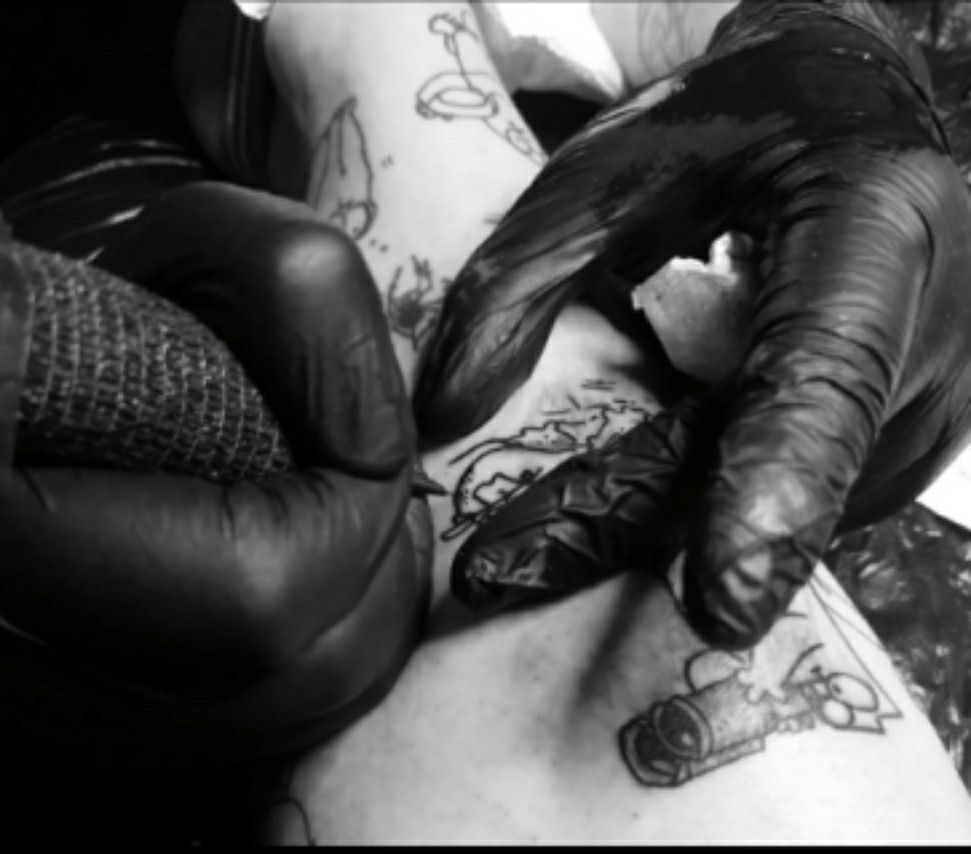 a person with narben tattoos on their back, altenkirchen, germany