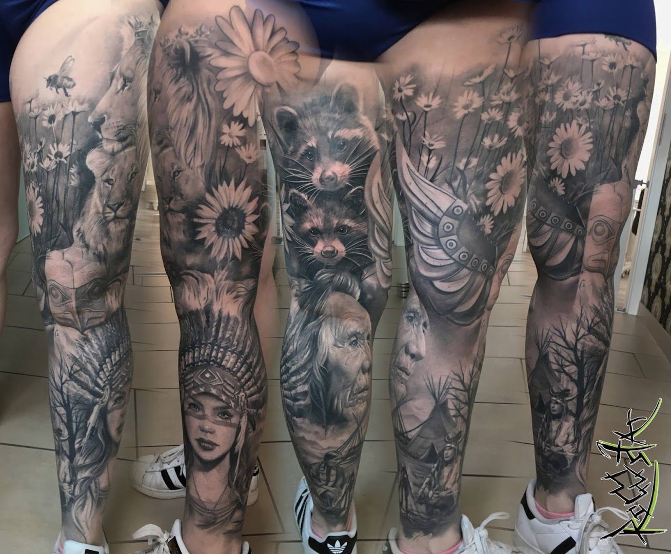 a woman's leg with a cover-up tattoo of flowers and a man's legs, salzlandkreis, germany