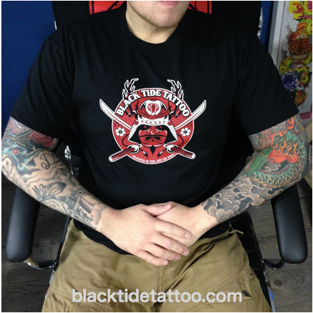 a man with narben tattoos sitting in a chair, kreisfreie stadt bottrop, germany