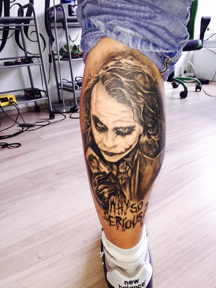 a narben tattoo of a man with a face and a name on his leg, freudenstadt, germany