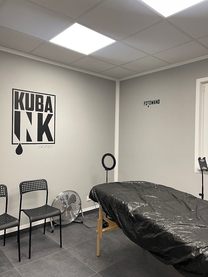 a room with a black chair and a black chair