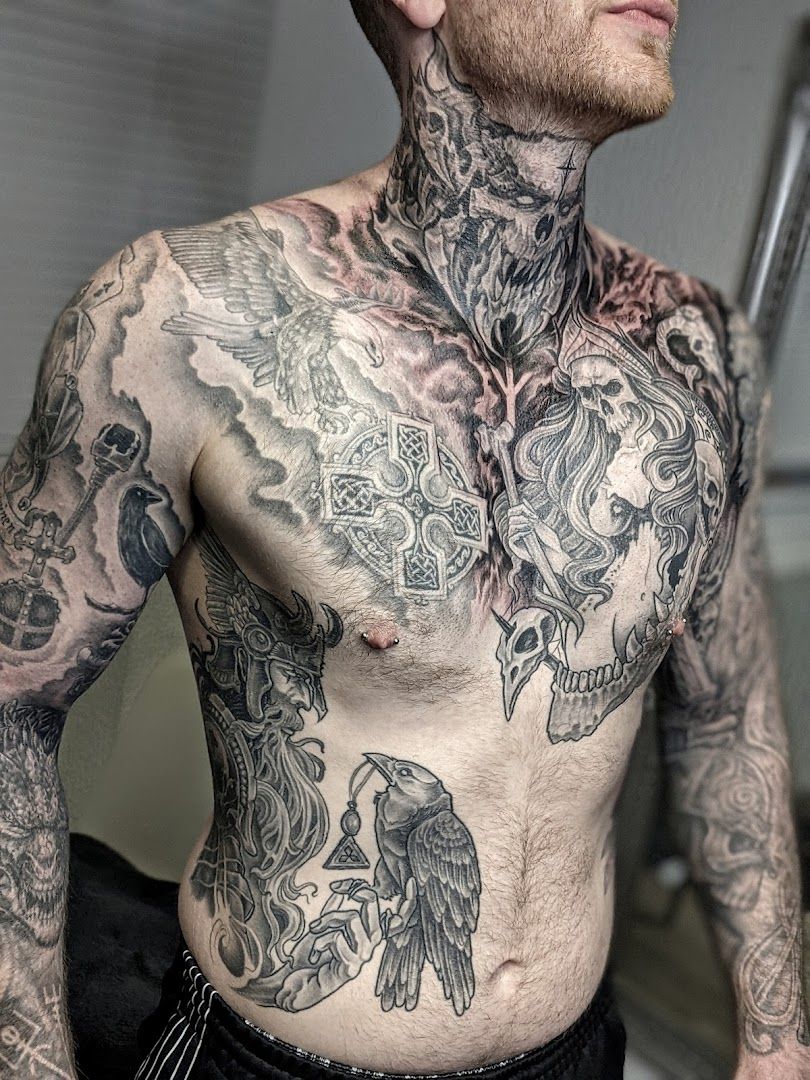 a man with narben tattoos on his chest, darmstadt-dieburg, germany