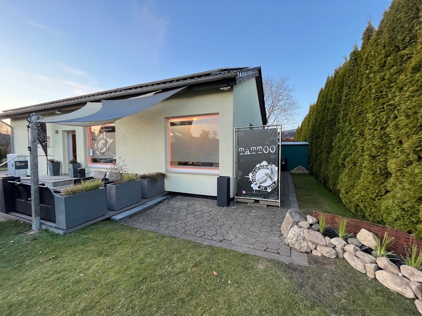 a house with a grill and grilling station