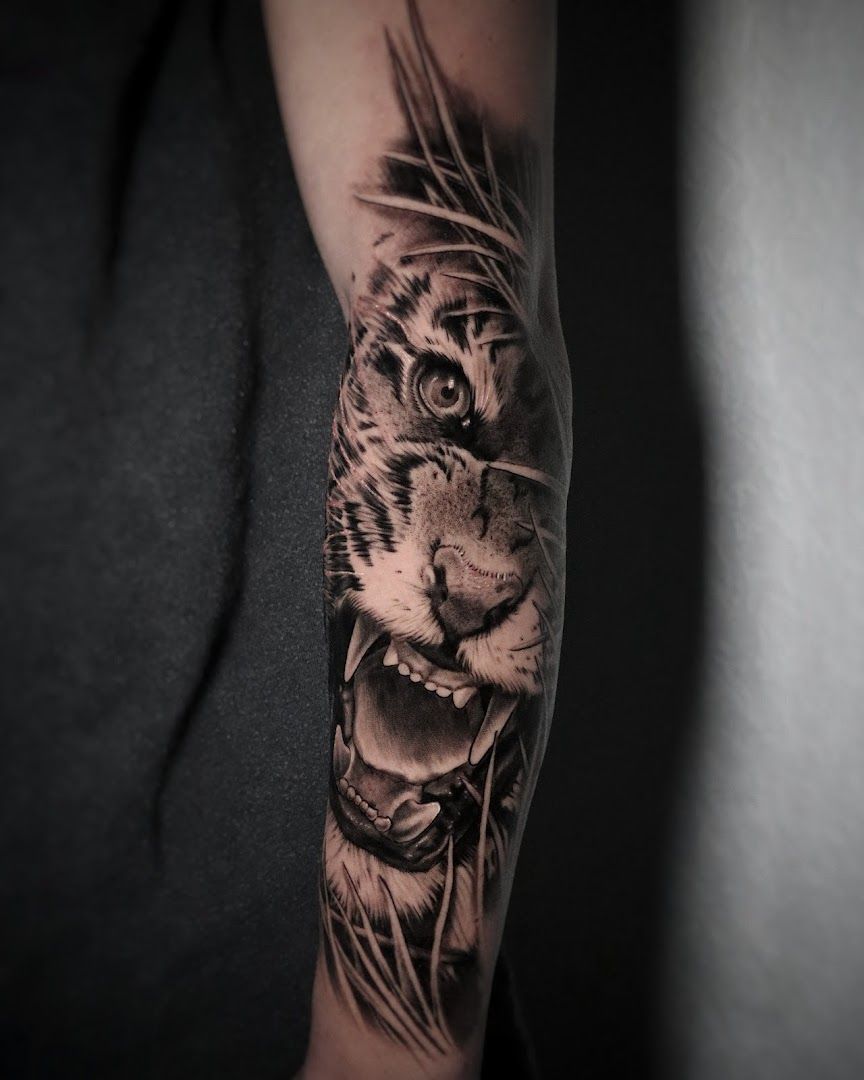 a black and white cover-up tattoo of a tiger, kassel, germany