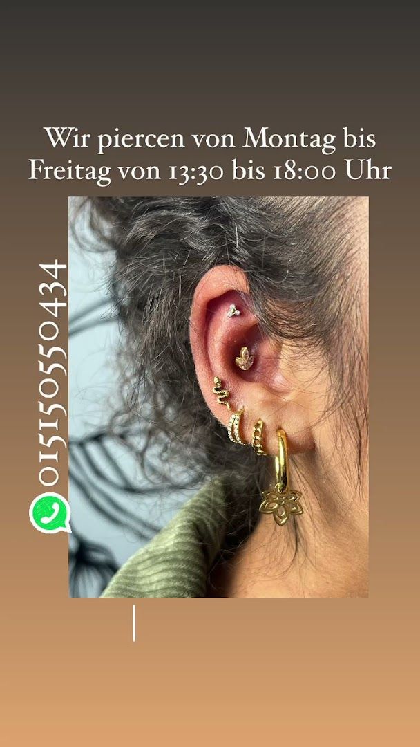 a woman with a pair of earrings on her ear