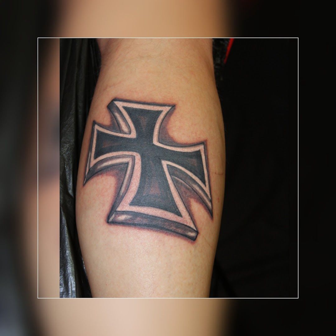 a narben tattoo with a cross on it, ravensburg, germany