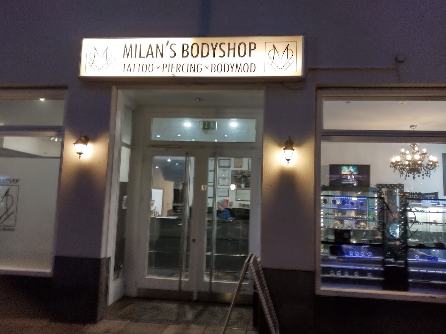 the entrance to the main shop at night