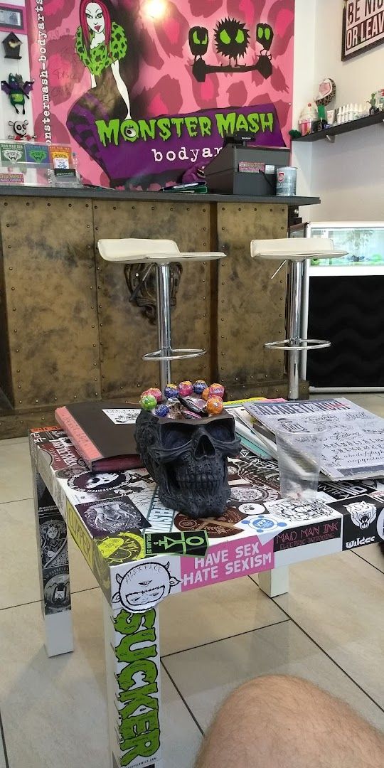 a table with a bunch of books on it