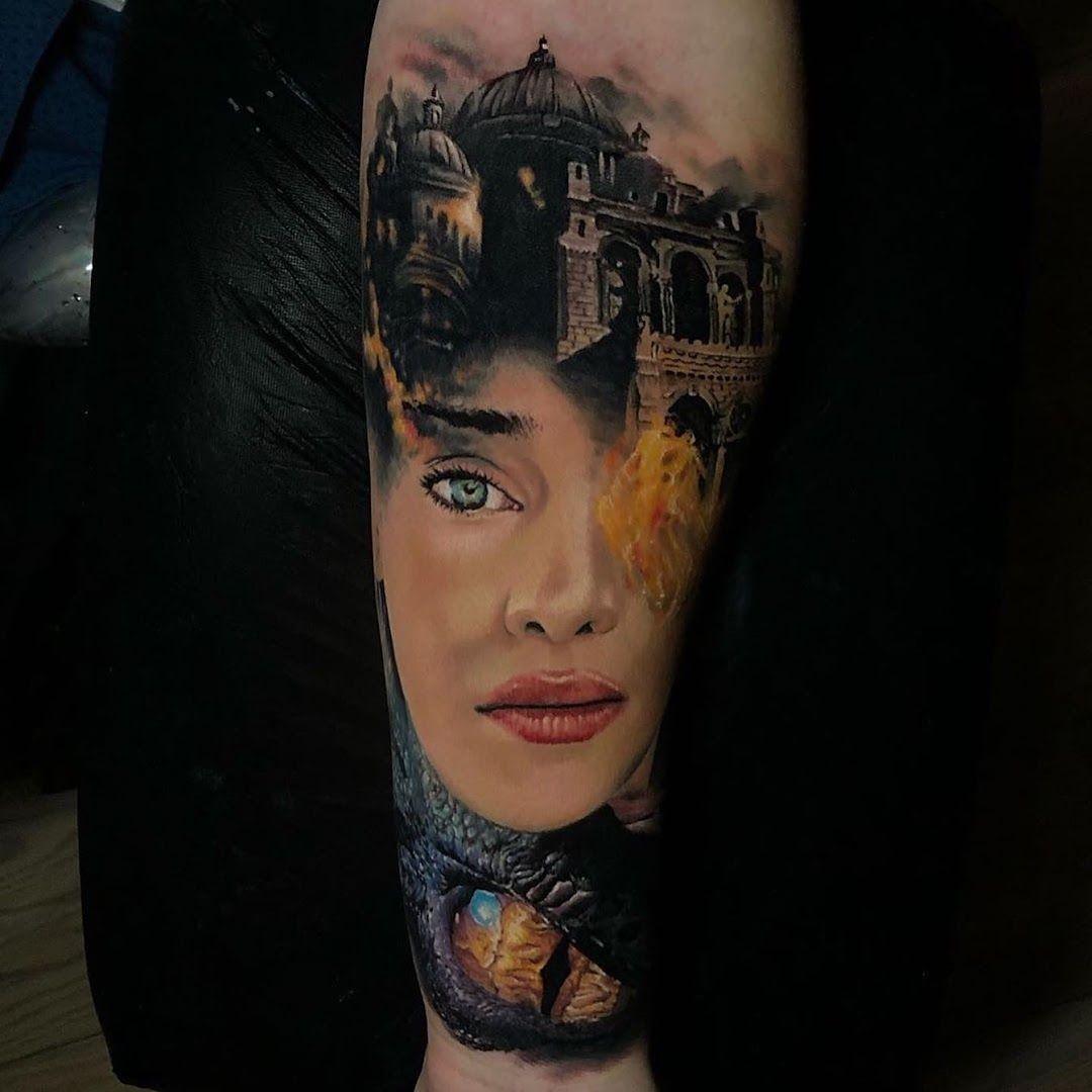 a woman with a castle cover-up tattoo on her arm, böblingen, germany