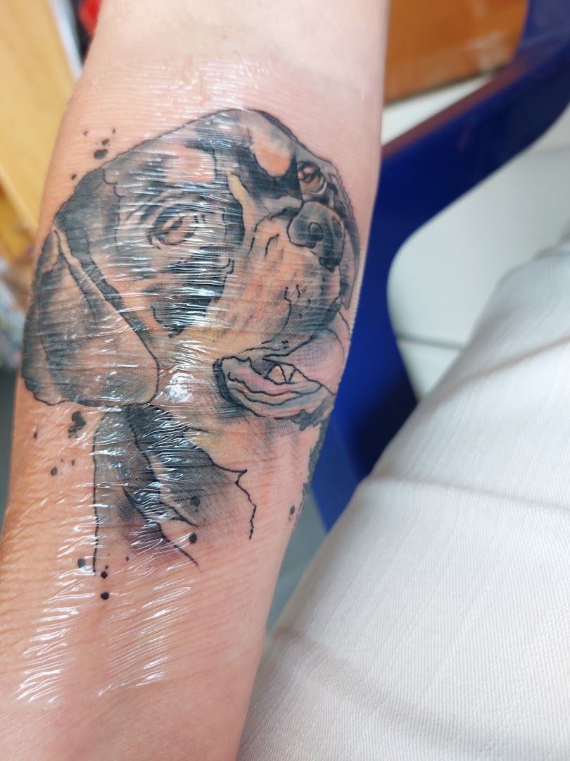 a narben tattoo of a dog on the wrist, bad dürkheim, germany