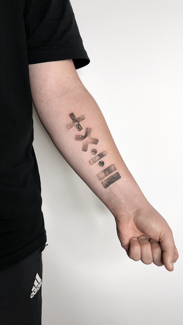 a man with a narben tattoo on his arm, berlin, germany