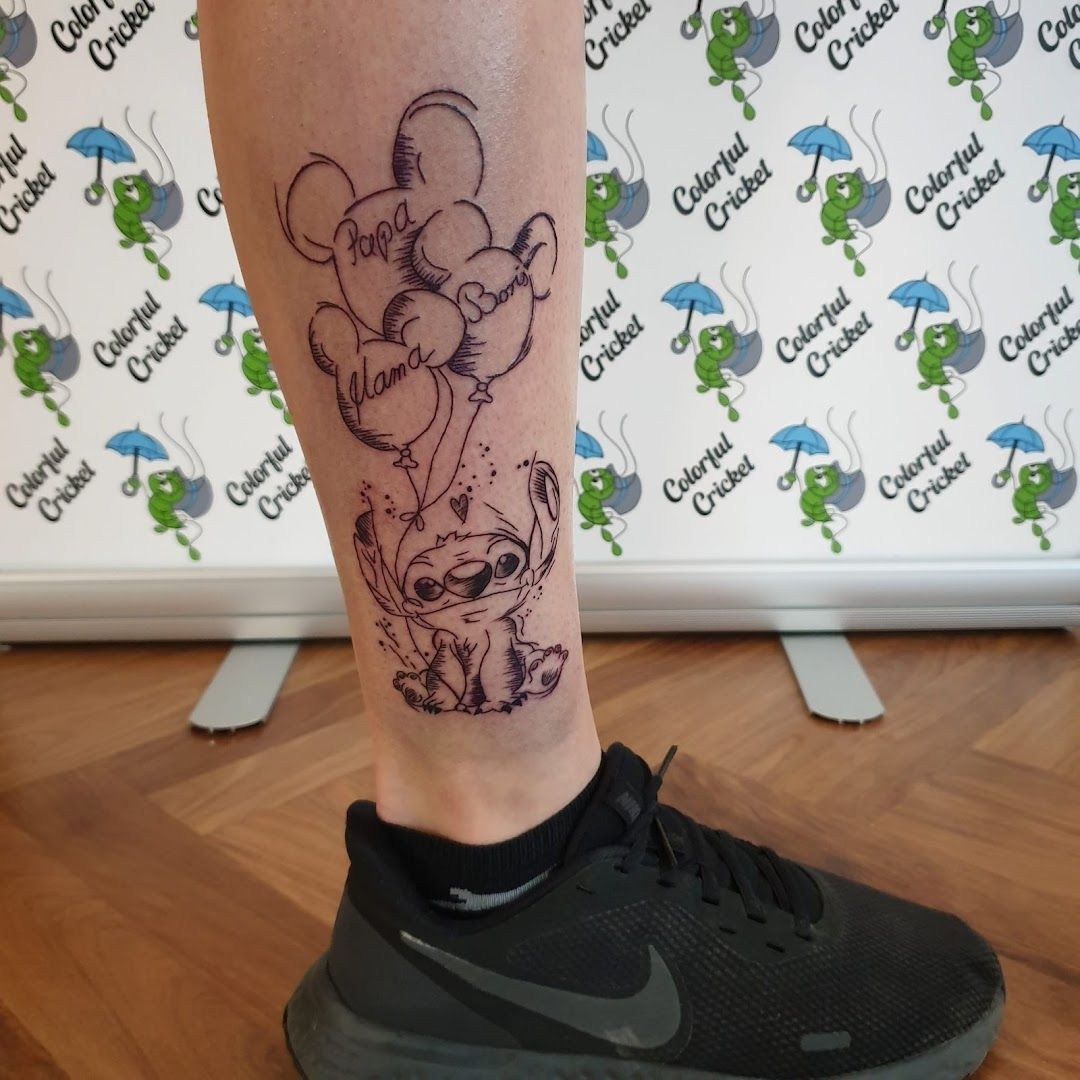 a narben tattoo of a cat and mouse on the leg, rhön-grabfeld, germany