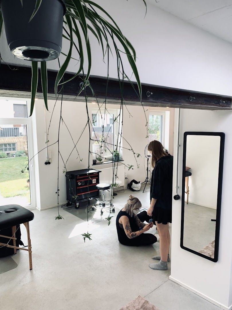 a woman is sitting on the floor in a room