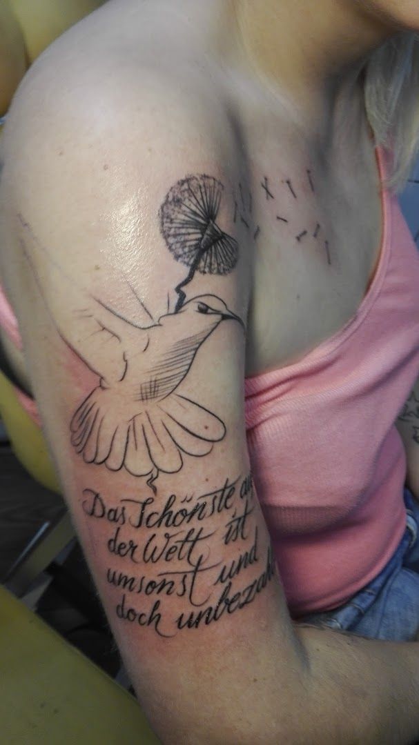 a woman with a narben tattoo on her shoulder, berlin, germany