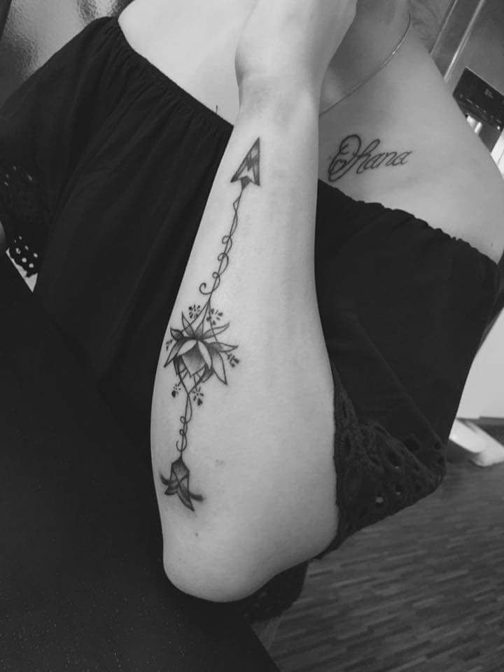 a woman with a cover-up tattoo on her arm, ansbach, germany