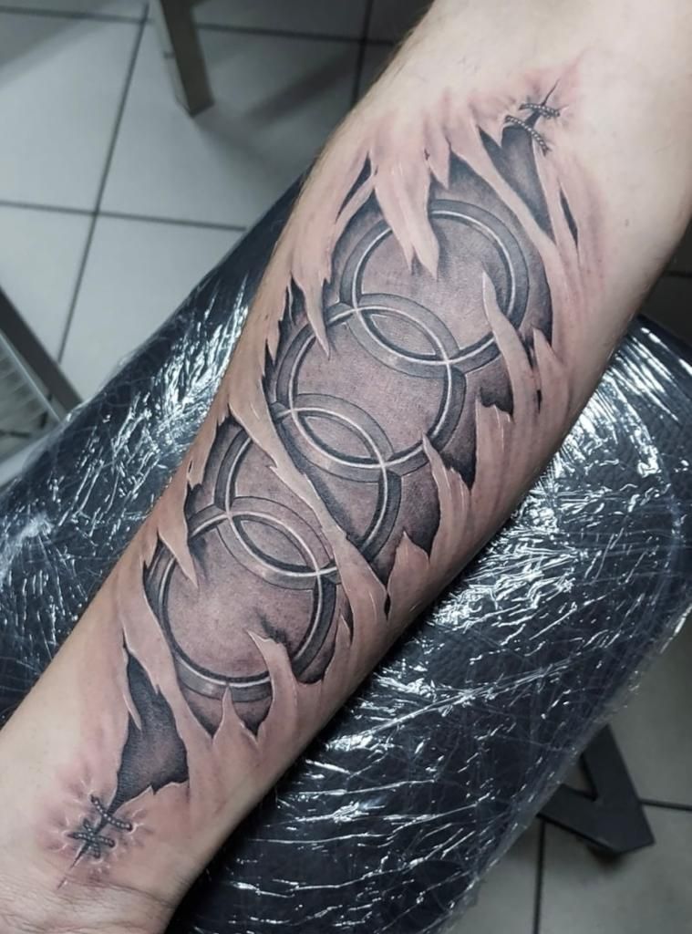 a japanische tattoos in leipzig with a black and white design on the arm, ebersberg, germany