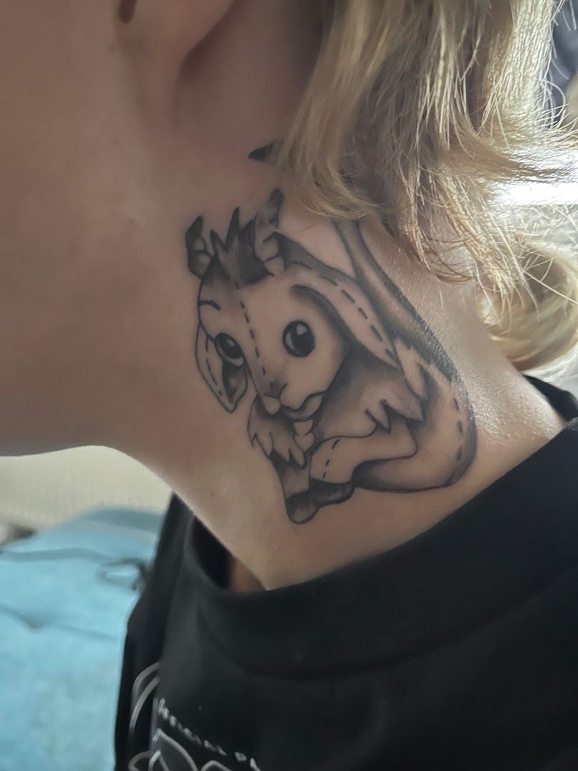 a woman with a cover-up tattoo on her neck, märkisch-oderland, germany