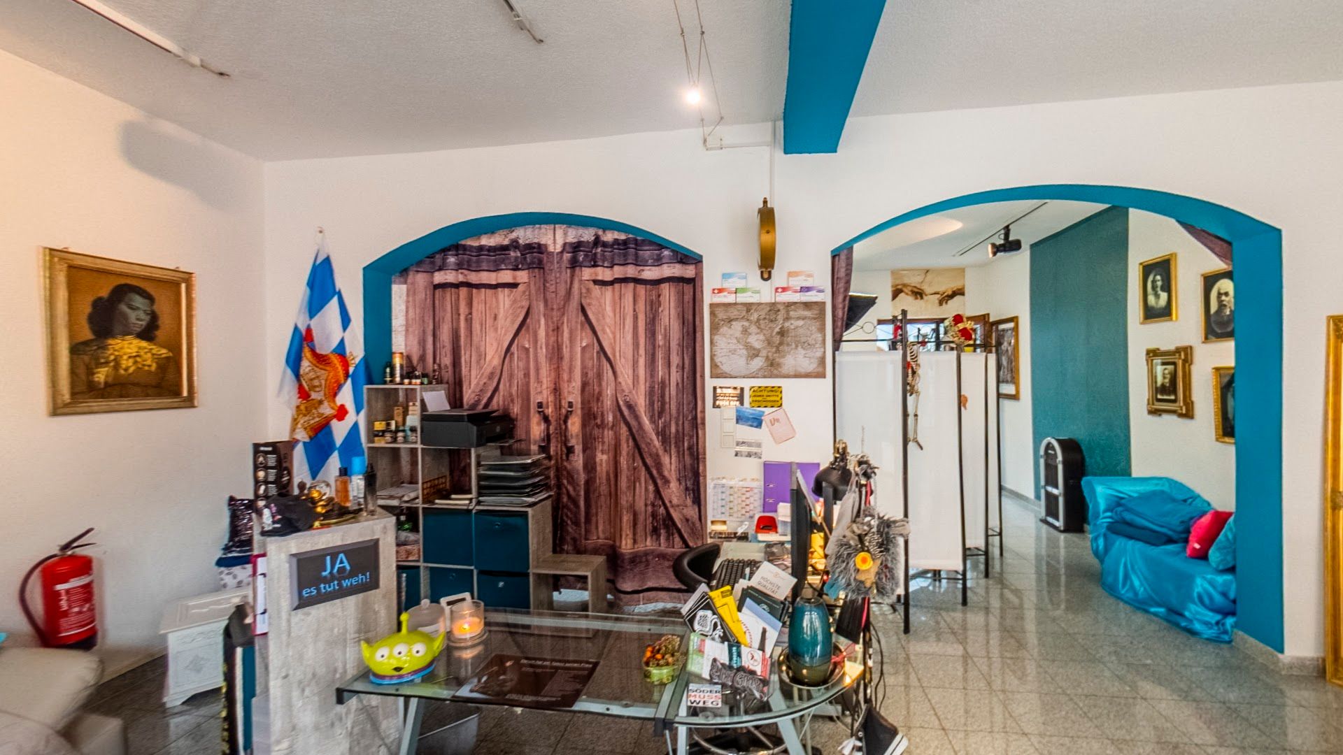 a living room with a couch and a television