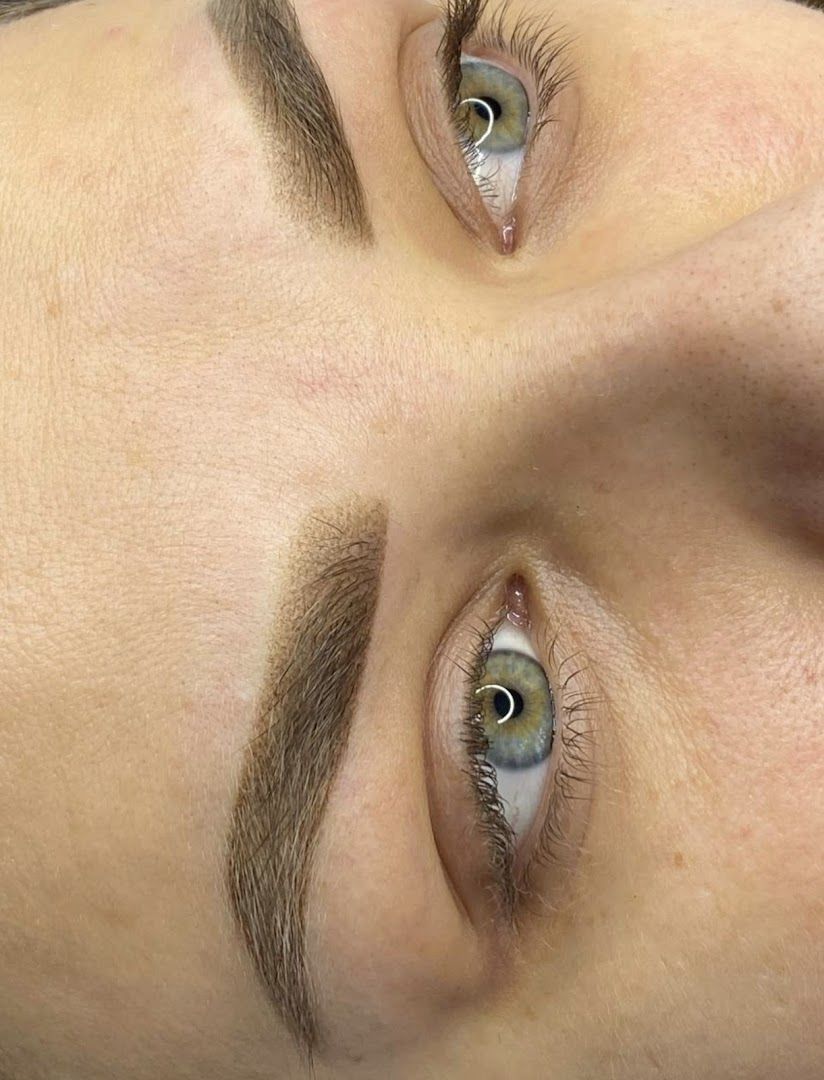 a woman with a very long eyebrow