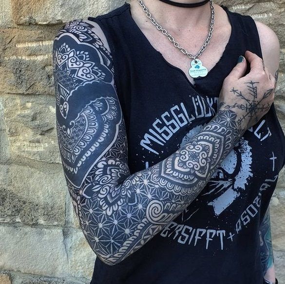 a woman with narben tattoos on her arms, bodenseekreis, germany