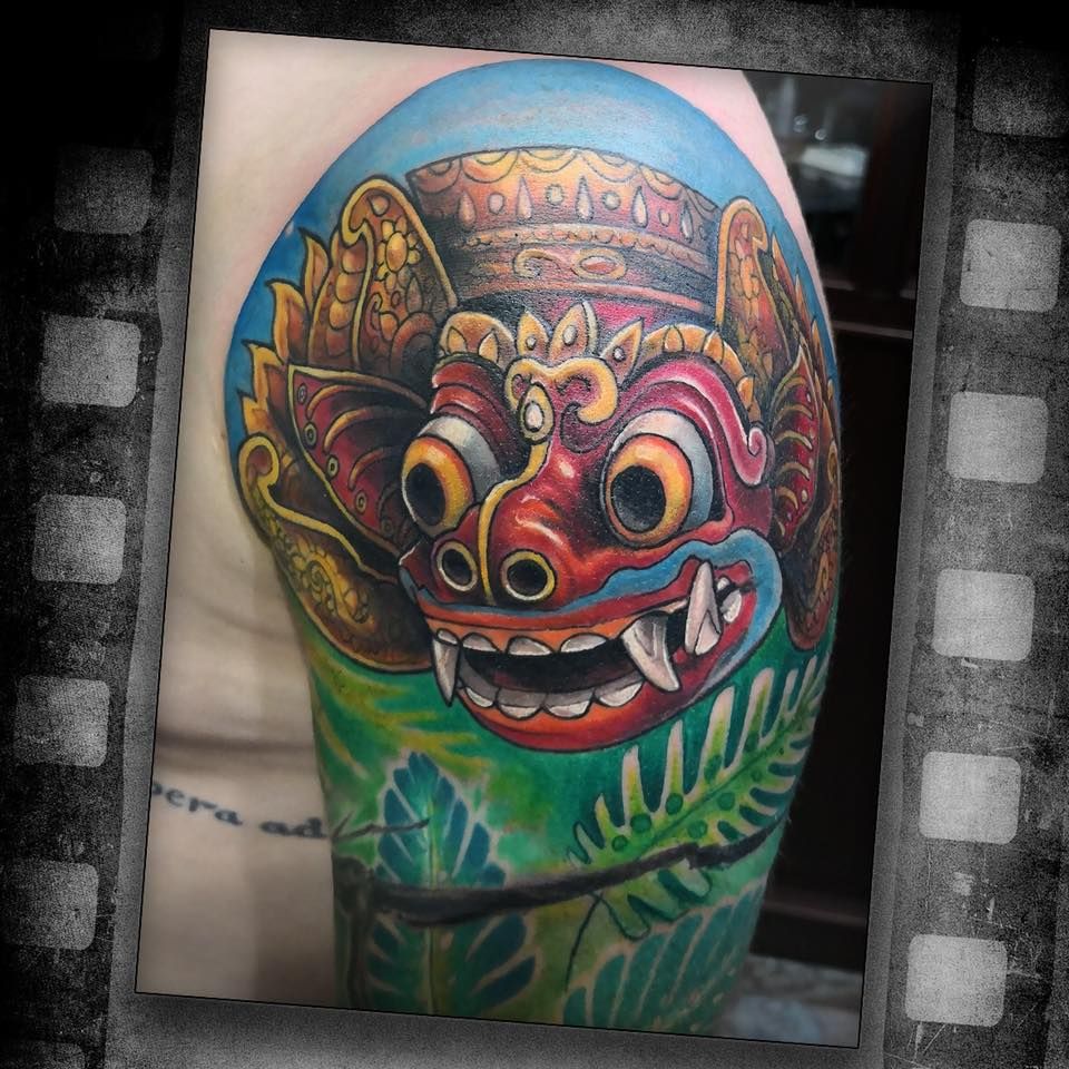 a narben tattoo of a monkey with a colorful background, bonn, germany