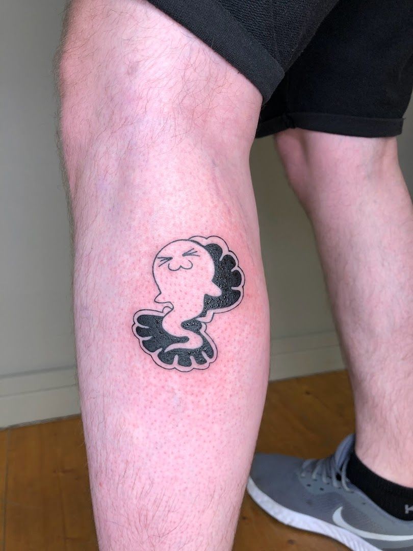 a man with a narben tattoo on his leg, stuttgart, germany