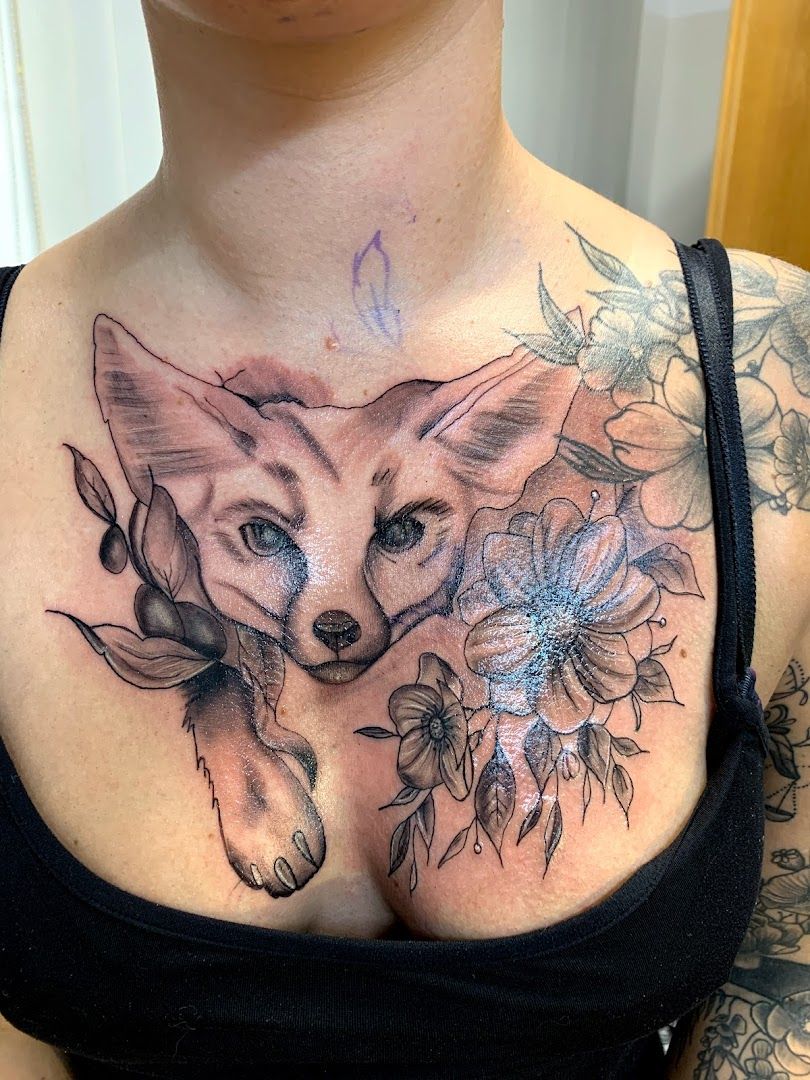 a woman with a portrait tattoos on her chest, neuburg-schrobenhausen, germany