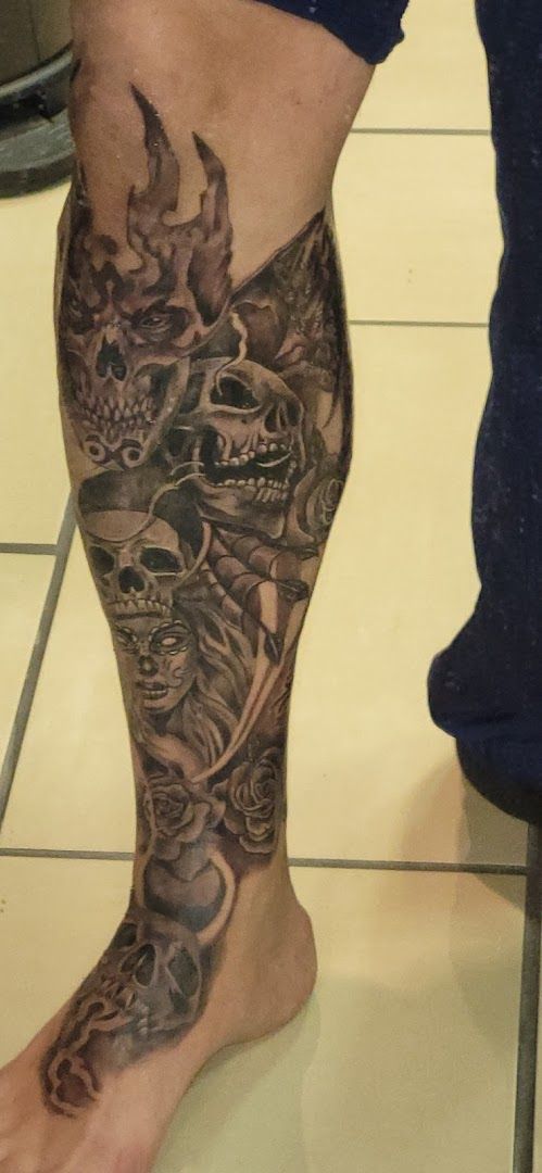 a man with a cover-up tattoo on his leg, peine, germany