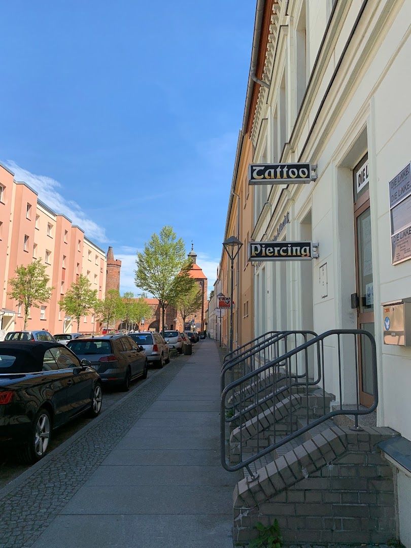 a street with cars parked on the side of it