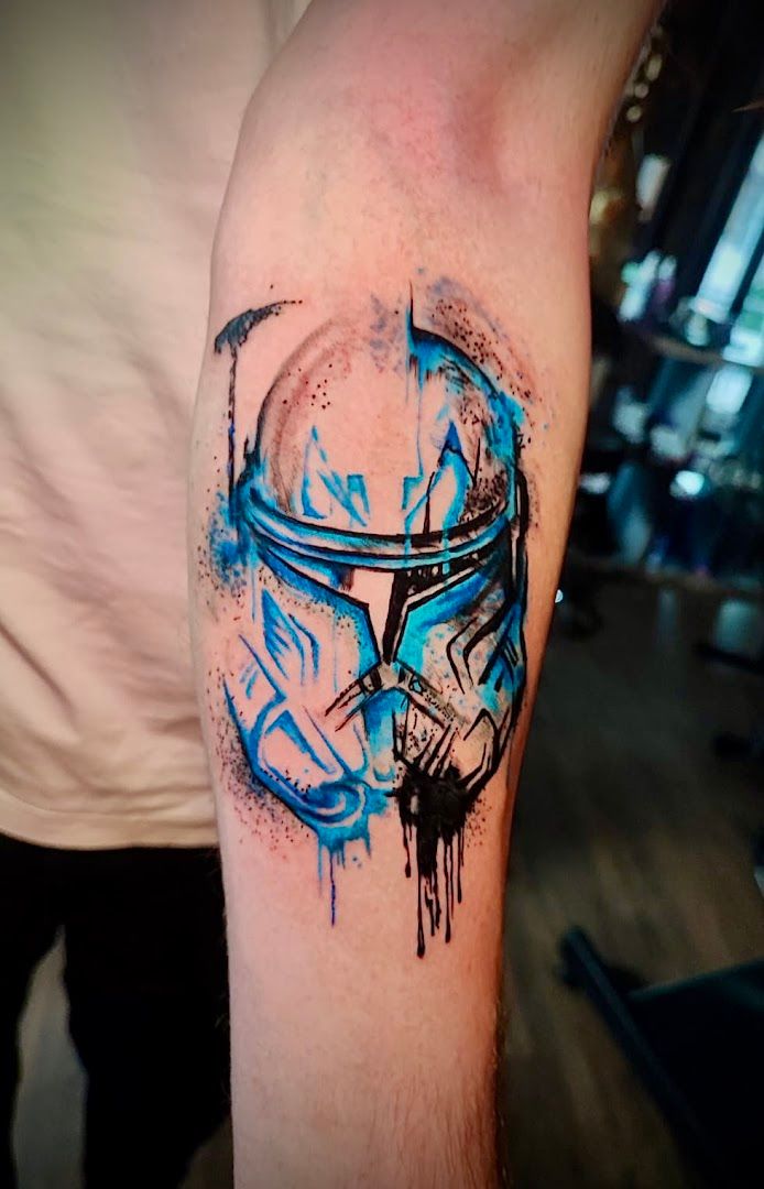 a narben tattoo with a blue and black ink on the arm, cuxhaven, germany