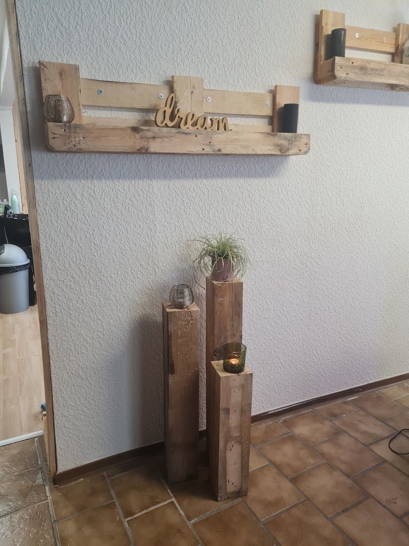 a wooden sign that says love on it