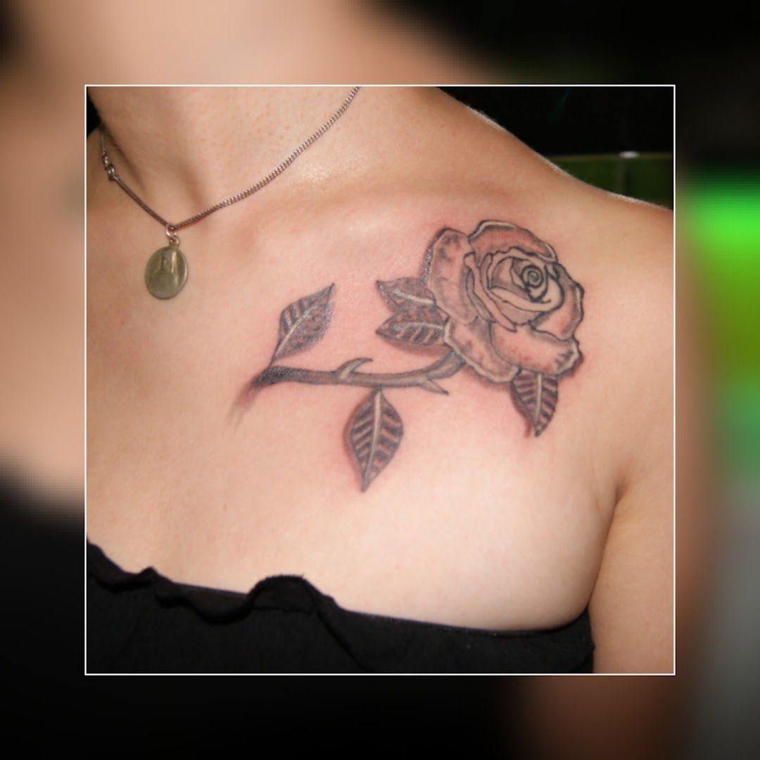 a woman with a rose narben tattoo on her chest, ravensburg, germany