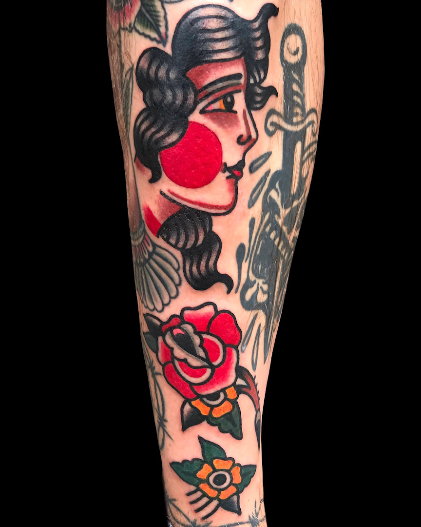 a narben tattoo with a girl and a rose on it, dresden, germany