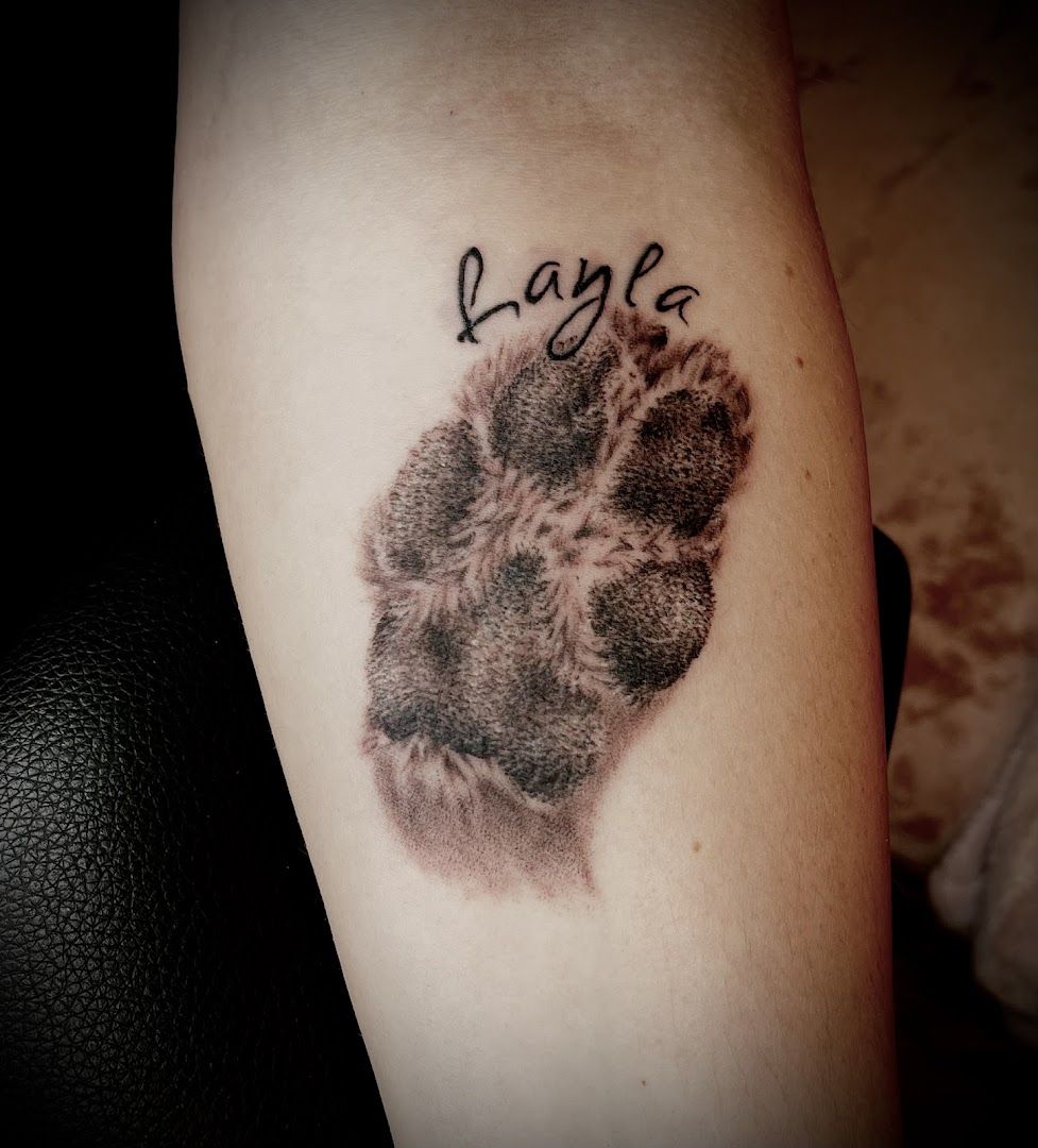 a narben tattoo with a dog paw and the word love, rhein-neckar-kreis, germany