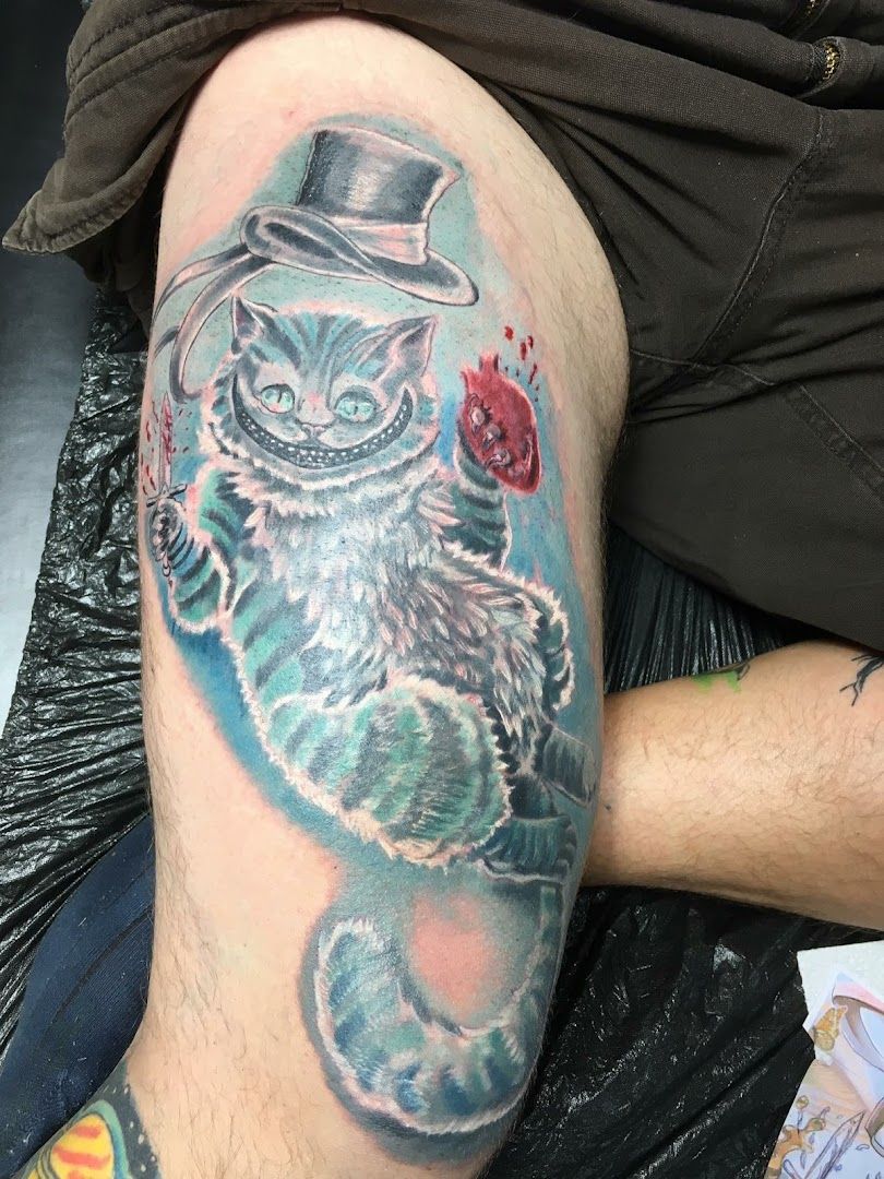 a japanische tattoos in leipzig of an owl with a top hat and a rose, berlin, germany