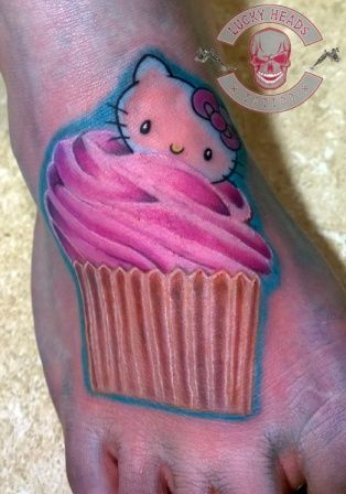 a cupcake cover-up tattoo on the foot, steinburg, germany