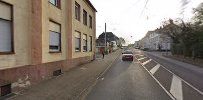 a street with a car parked on the side