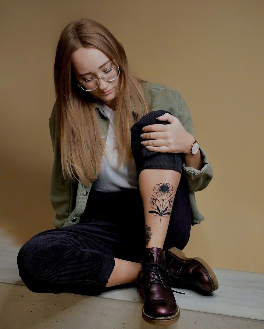 a girl with a narben tattoo on her arm, bayreuth, germany