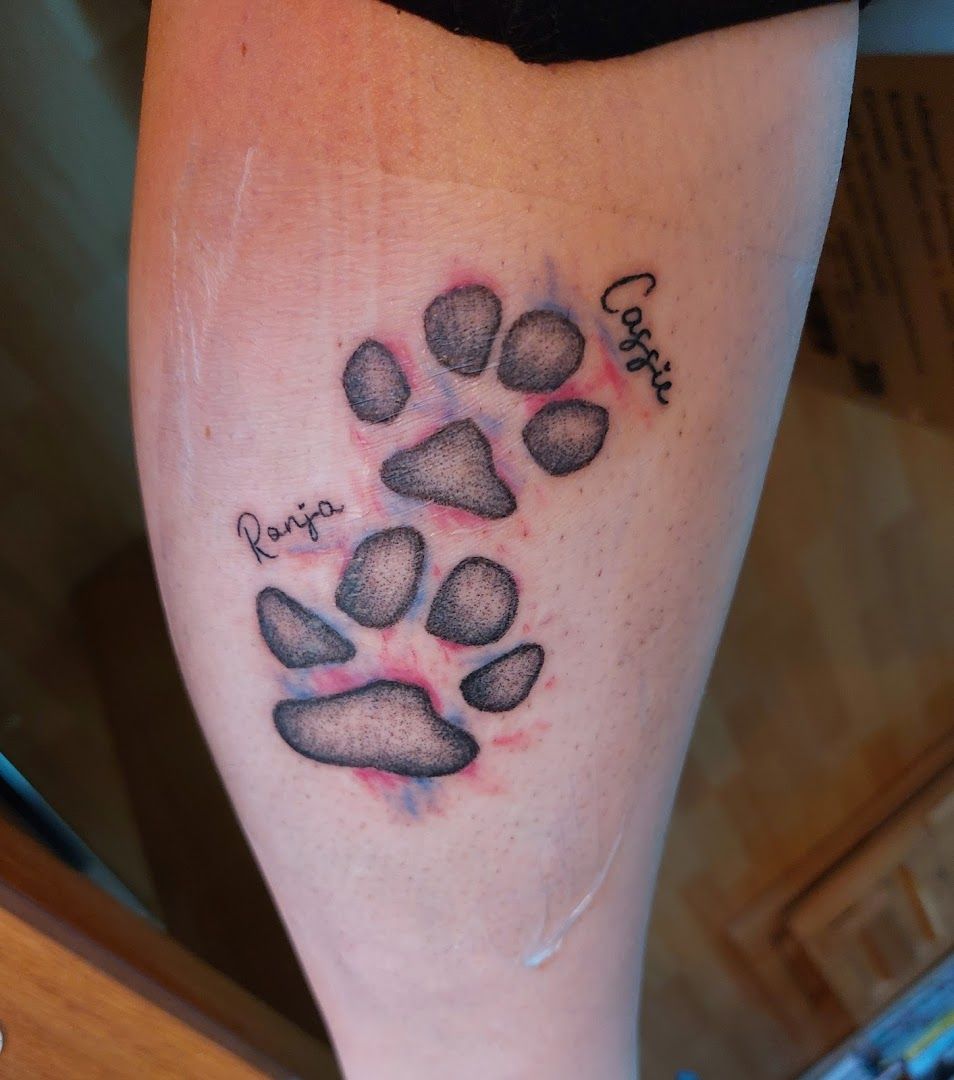 a narben tattoo of a dog paw with a paw paw on it, county of bentheim, germany