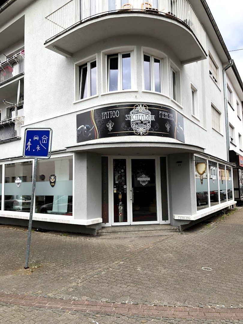 a white building with a sign on the front